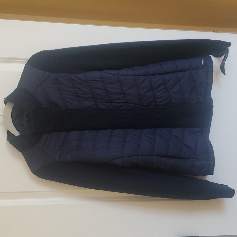Kyodan puffer jacket with sweater sleeves